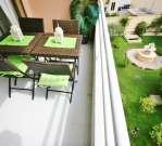Balcony overlooks a peaceful garden Balcony overlooks a peaceful garden